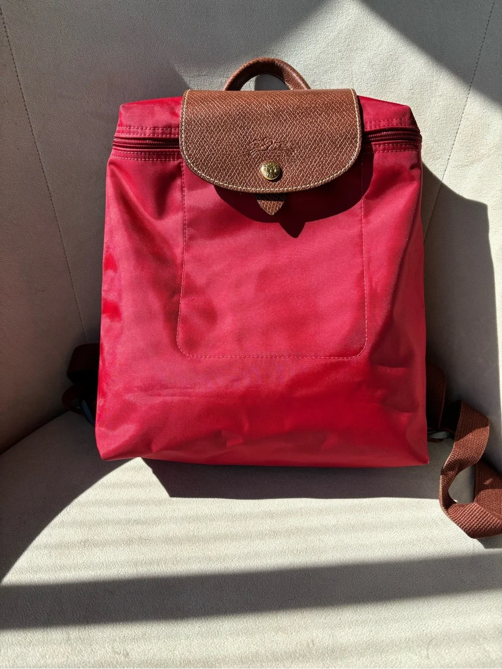 Longchamp Le Pliage Red Women's Nylon Backpack with Brown Leather Flap